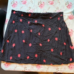 From Rachel Black Skirt with Pink Floral Pattern